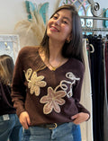 Tejido (sweater) bordado